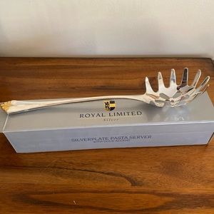 Royal Limited silver plated pasta spaghetti server with gold accent.